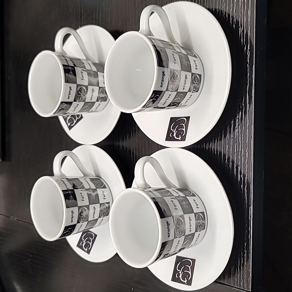 (4) Alpine Cuisine espresso cups with saucers.